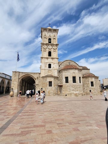 The stone exterior and bell tower of the Church of Saint Lazarus in Larnaca