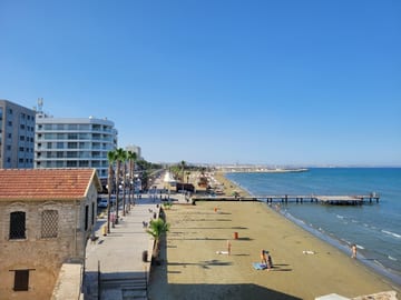 The sandy beach and waterfront viewed from Larnaca Fort