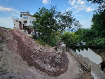 A hillside property under construction or renovation in Puerto Vallarta